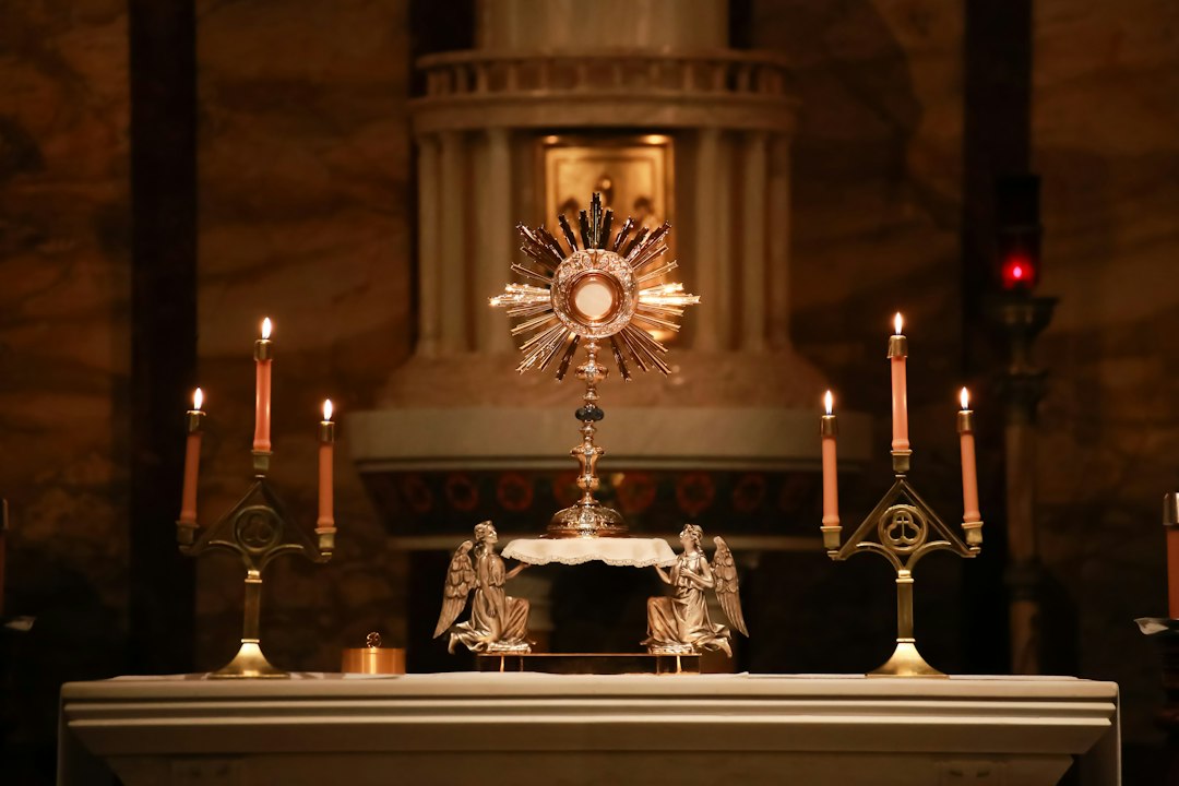 Eucharistic Adoration before the Blessed Sacrament in a Catholic chapel.